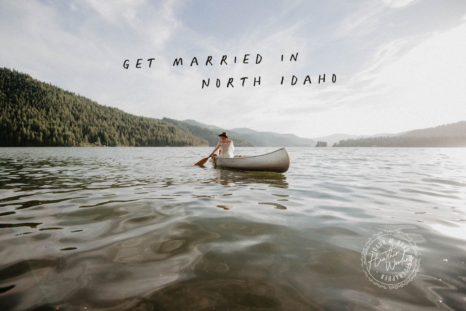 Bride in canoe on Idaho Lake for Wedding